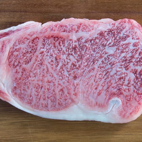 What's written on the Olive Wagyu seal?