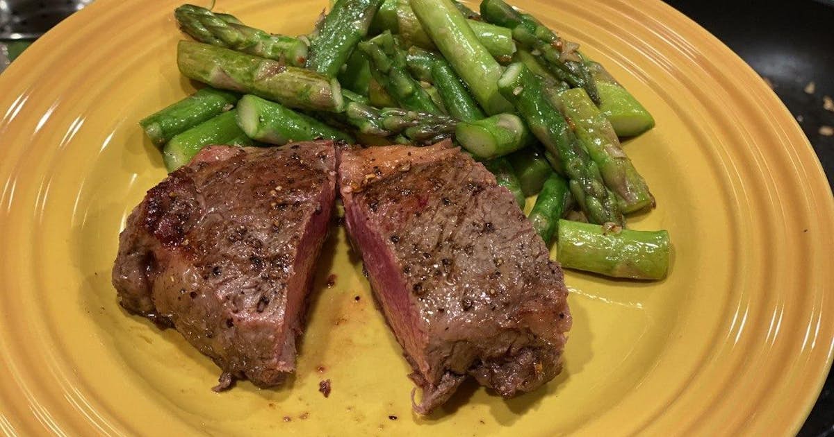 New York Strip Steak with Pan-Fried Garlic Asparagus