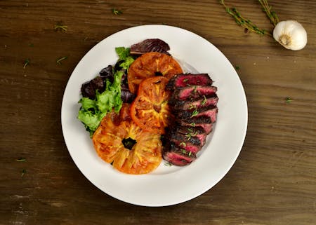 Zesty Denver Steak with Grilled Tomatoes